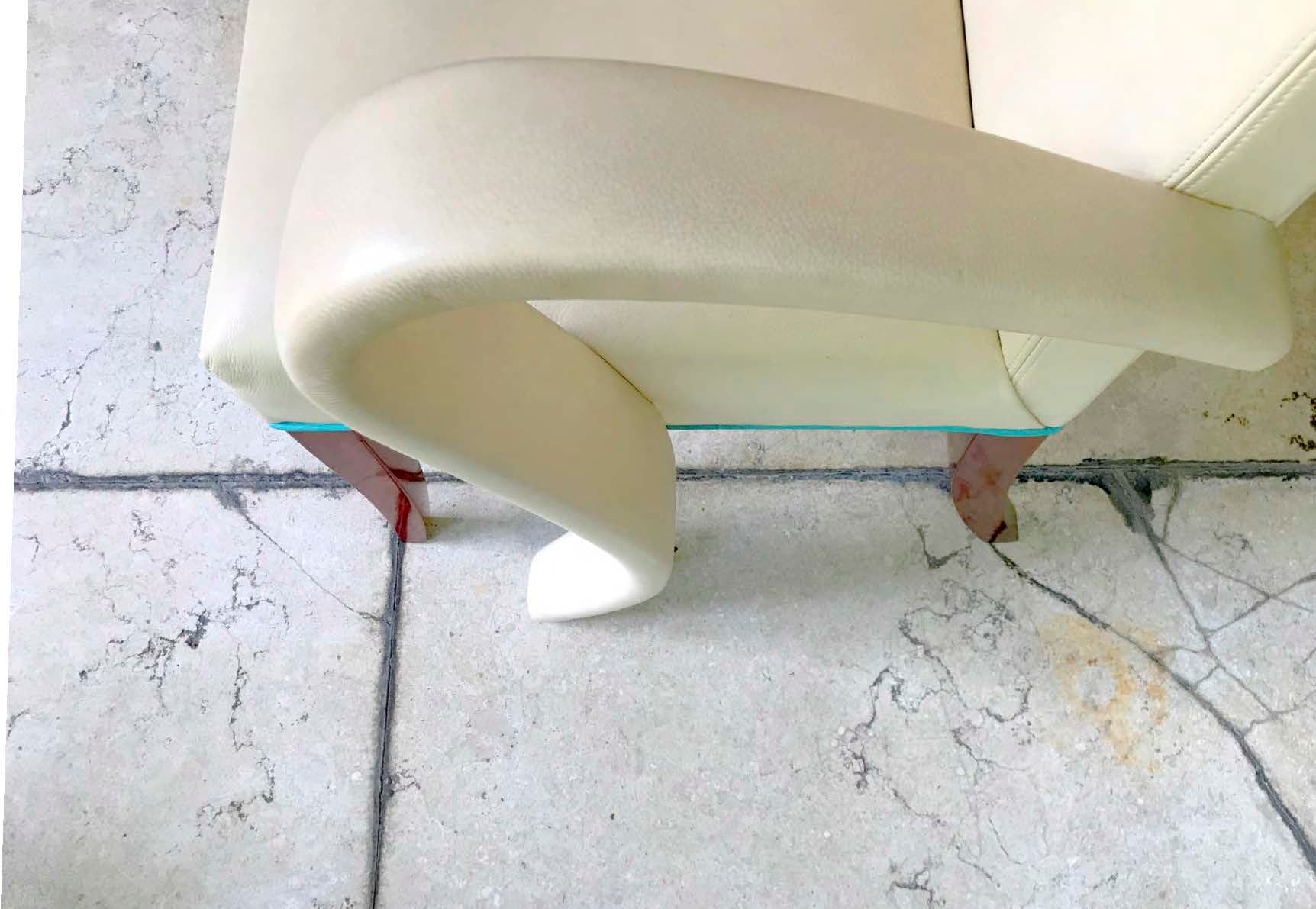 Organic cream armchair with sculptural legs